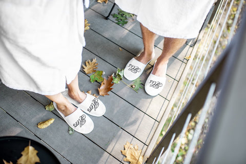 Image of his and hers hotel slippers