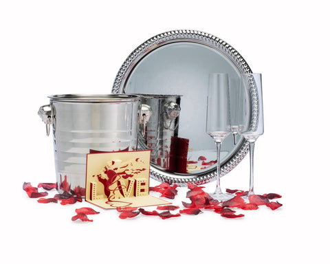 Image of serving tray champagne bucket flutes romantic greeting card and rose petals for romantic night