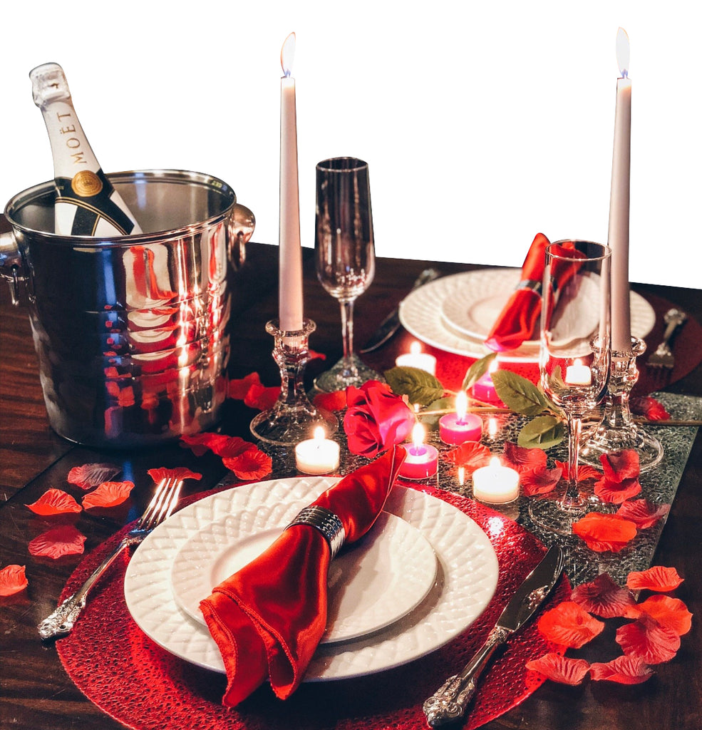 stainless steel champagne bucket on a romantic dinner table setting