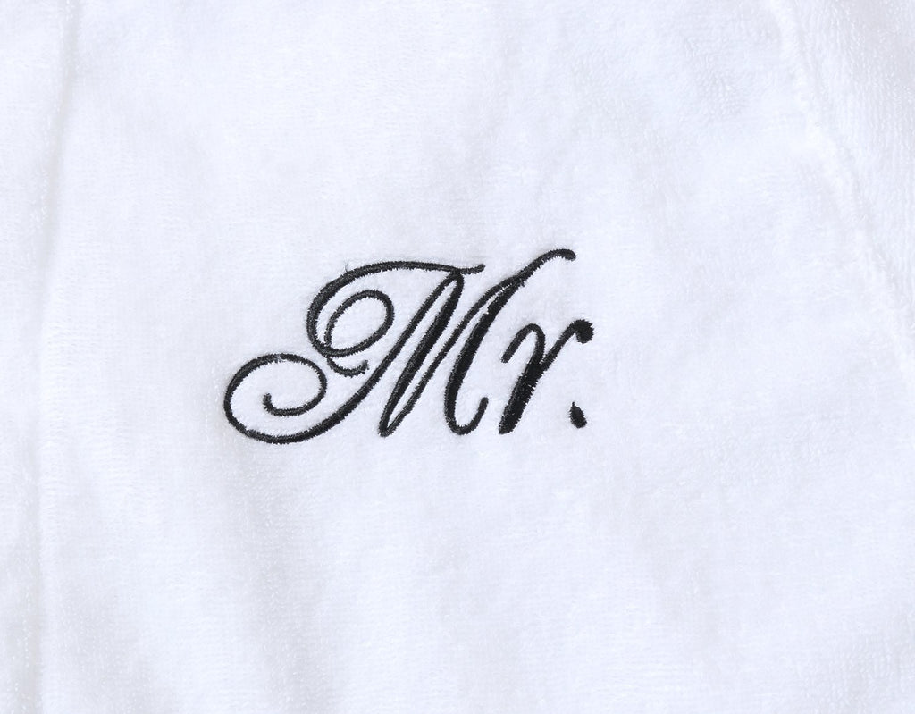 Mr stitching on couples matching Mr and Mrs bathrobes for wedding gifts
