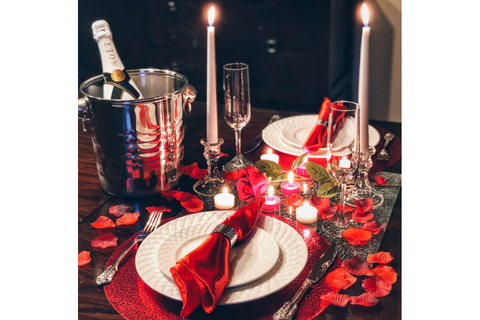 Image of romantic valentine's day dinner at home table decorations