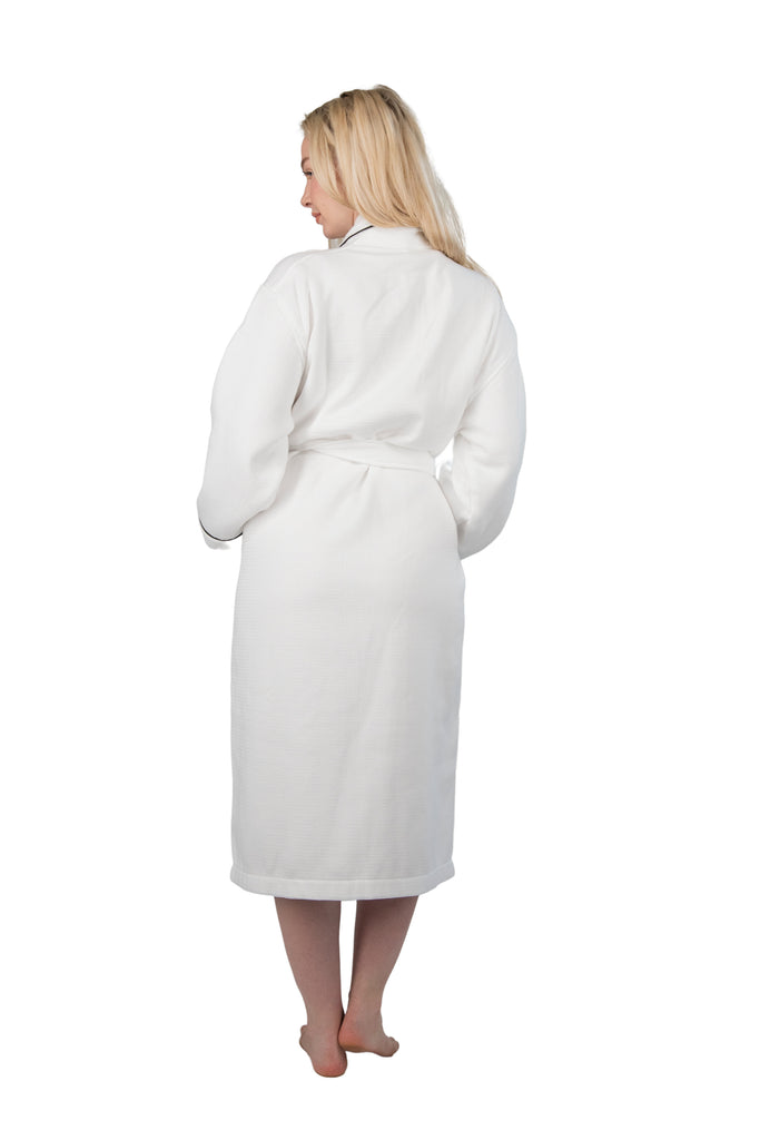 back view of the white velour robe with black piping 