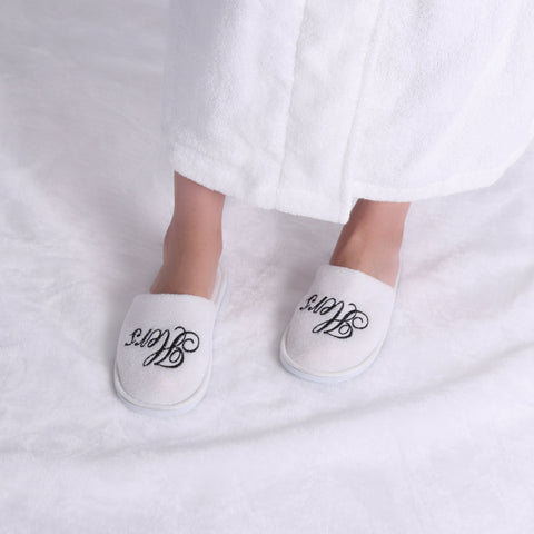 Image of his and hers robes and slippers
